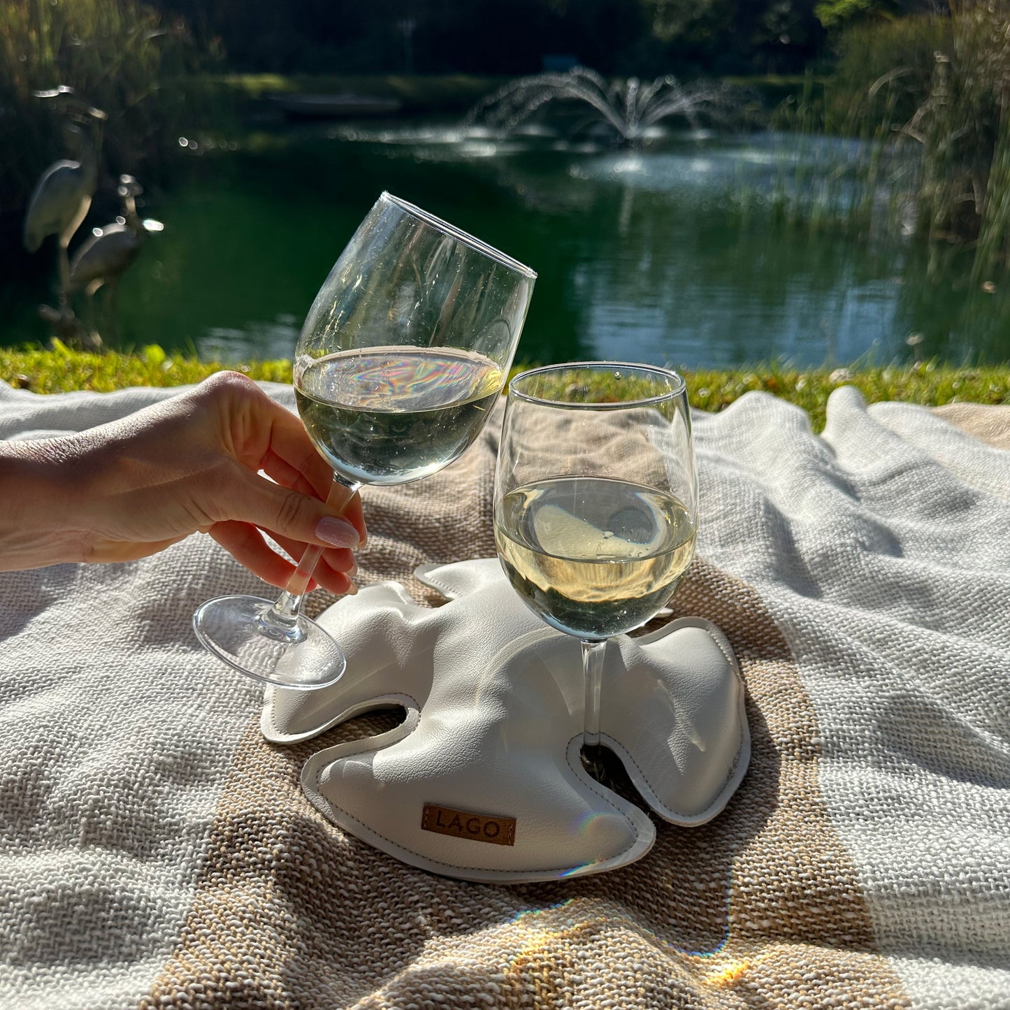 Our Classic Cloud stemmed glass stabilizer working it's magic at a picnic with refreshing pinot grigio.