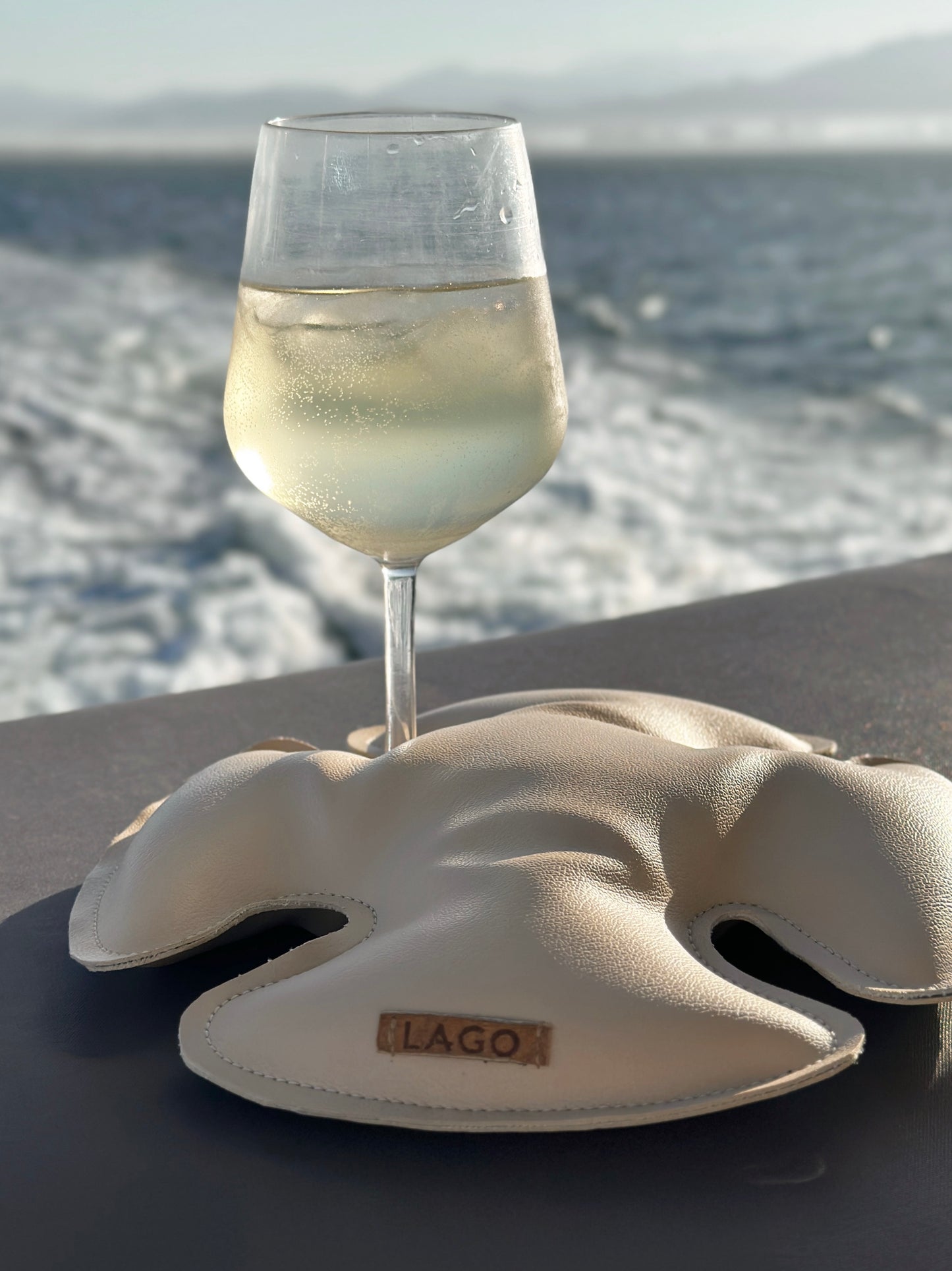 Discover the elegance of LAGO's Classic Sand Dollar Wine Glass Holder, blending seamless functionality with the beauty of the great outdoors. Ideal for picnics, beach days, and more.